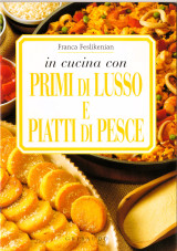 In cucina con primi di lusso e piatti di pesce
